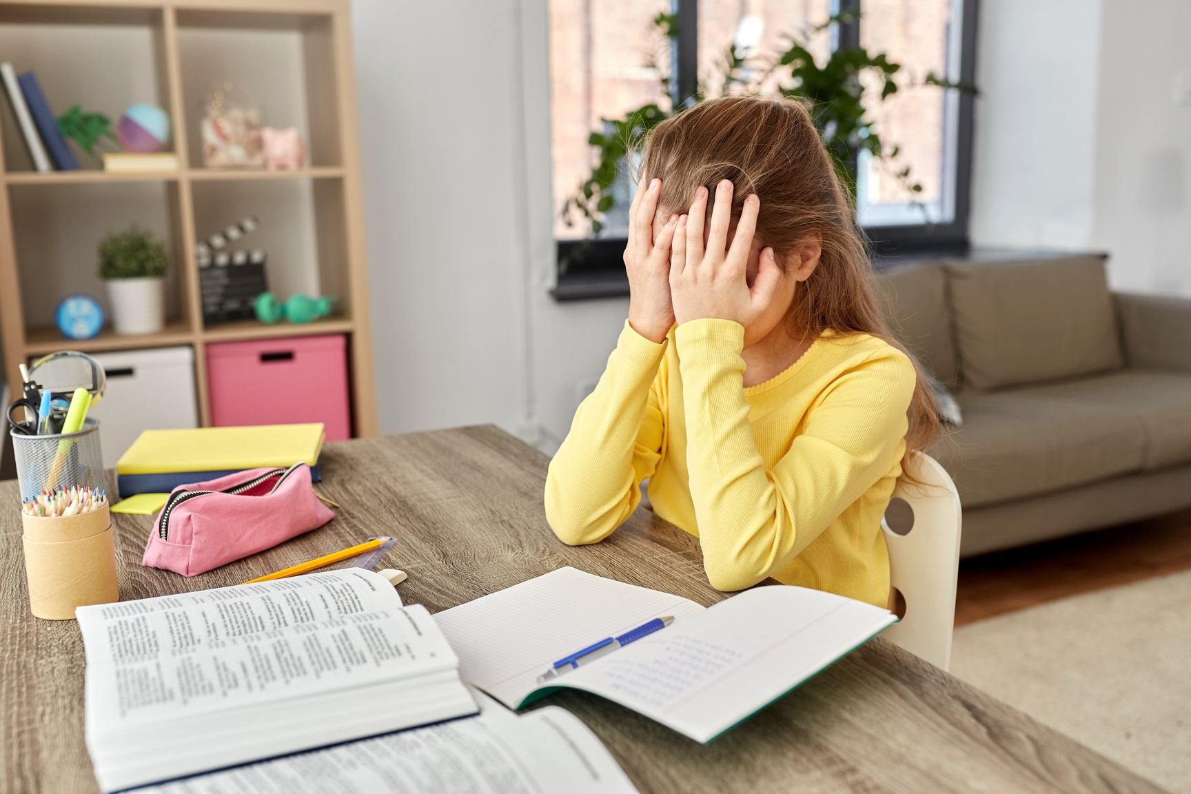 Stressed Little Student Girl Learning at Home